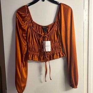 Burnt orange long sleeve top